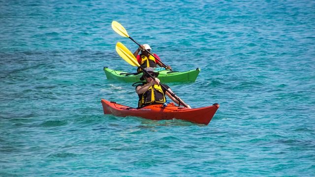 Two kayakers in open water - Benefits of kayaking